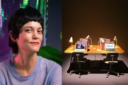 Smiling woman next to art installation